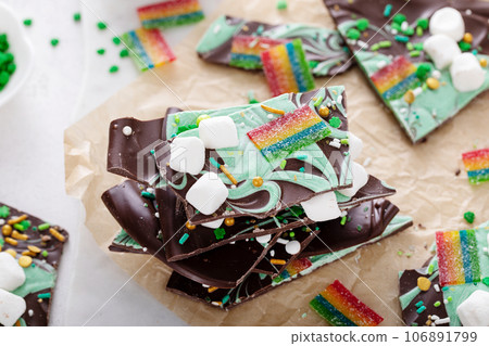 St Patricks day chocolate bark with sprinkles and rainbows St Patricks day chocolate bark with sprinkles and rainbows 106891799