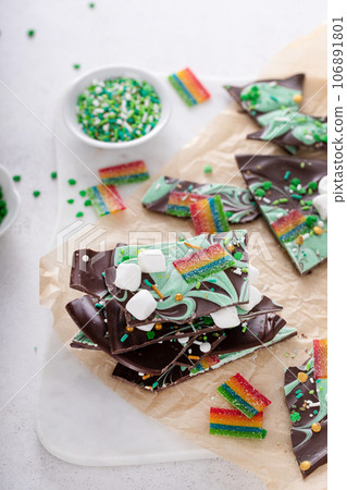 St Patricks day chocolate bark with sprinkles and rainbows St Patricks day chocolate bark with sprinkles and rainbows 106891801
