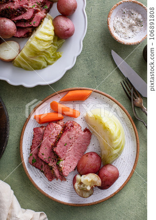 Corned beef with cabbage and potatoes dinner with soda bread 106891808