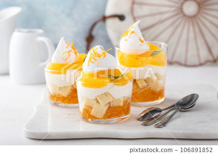 Orange pound cake trifle with cream cheese mousse 106891852