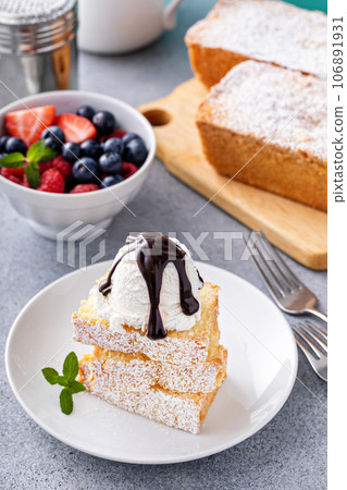 Homemade pound cake served with ice cream 106891931