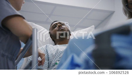 Man lies and talks with doctors before surgery Man lies and talks with doctors before surgery 106892526