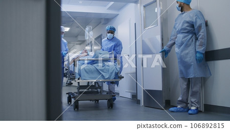Nurse and paramedic open medical facility corridor 106892815