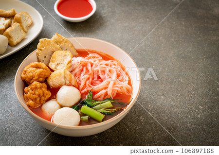 small flat rice noodles with fish balls and shrimp balls in pink soup, Yen Ta Four or Yen Ta Fo small flat rice noodles with fish balls and shrimp balls in pink soup, Yen Ta Four or Yen Ta Fo 106897188