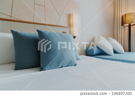 beautiful and comfortable pillow decoration in bedroom 106897200