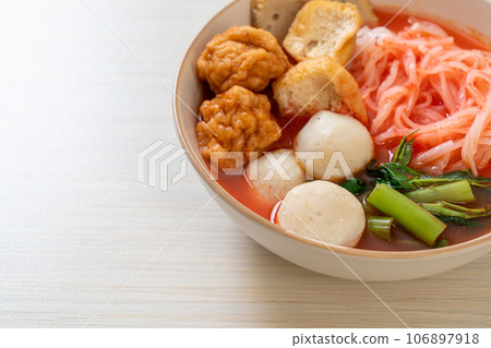 small flat rice noodles with fish balls and shrimp balls in pink soup, Yen Ta Four or Yen Ta Fo small flat rice noodles with fish balls and shrimp balls in pink soup, Yen Ta Four or Yen Ta Fo 106897918