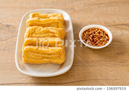 fried tofu with sauce 106897919