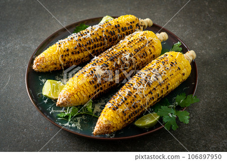 barbecue and grilled corn with cheese and lime barbecue and grilled corn with cheese and lime 106897950