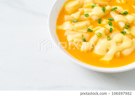 tteokbokki with cheese or Korean rice cake with cheese tteokbokki with cheese or Korean rice cake with cheese 106897982