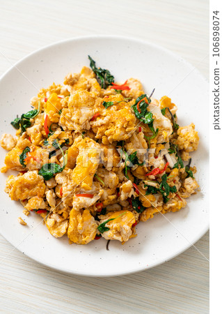 stir-fried egg with Thai basil and chilli stir-fried egg with Thai basil and chilli 106898074