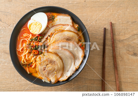 Ramen Noodles Spicy Tomyum Soup with Roast Pork 106898147