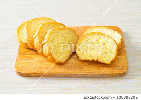 potatoes bread sliced on wood board potatoes bread sliced on wood board 106898299