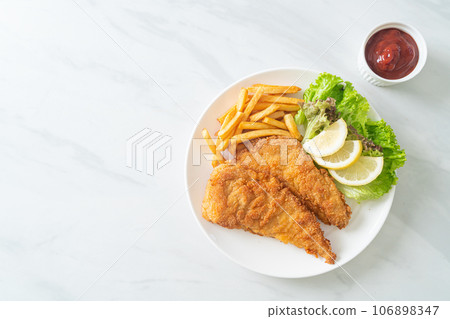 Homemade Breaded Weiner Schnitzel with Potato Chips Homemade Breaded Weiner Schnitzel with Potato Chips 106898347