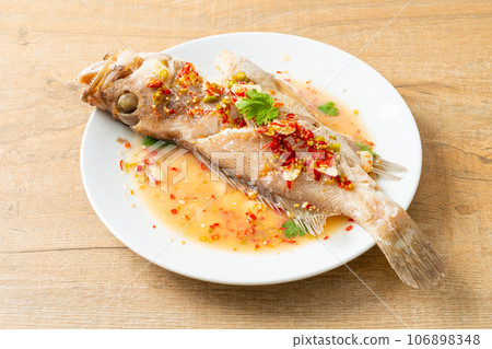 Steamed grouper fish with lime and chillies Steamed grouper fish with lime and chillies 106898348