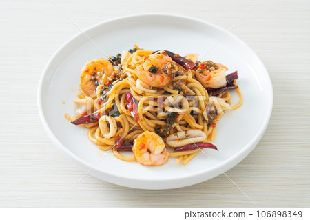 spicy spaghetti seafood on plate spicy spaghetti seafood on plate 106898349