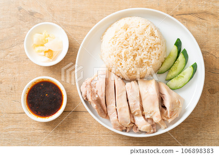 Hainanese chicken rice or rice steamed with chicken soup 106898383
