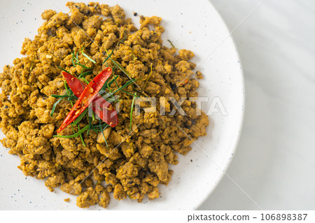 Stir Fried Pork with Yellow Curry Paste Stir Fried Pork with Yellow Curry Paste 106898387