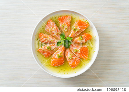Spicy Salmon in Seafood Salad Sauce 106898418