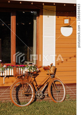 Vintage Bicycle Against Cottage Wall Vintage Bicycle Against Cottage Wall 106898463
