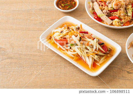 Som Tum - Spicy papaya salad Som Tum - Spicy papaya salad 106898511