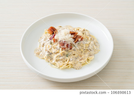 spaghetti with truffle cream sauce and mushroom spaghetti with truffle cream sauce and mushroom 106898613
