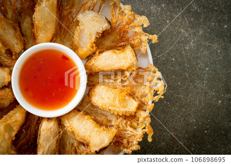 deep fried Enoki mushroom and King Oyster mushroom with spicy dipping sauce 106898695