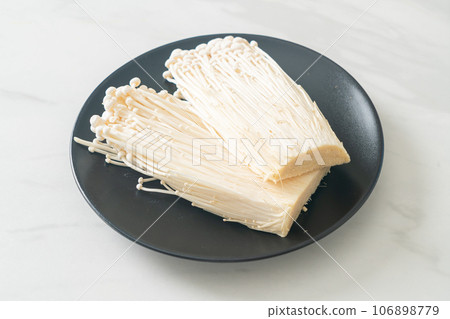 fresh enoki mushroom or golden needle mushrooms fresh enoki mushroom or golden needle mushrooms 106898779