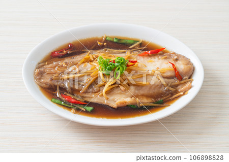 Steamed Fish with Soy Sauce 106898828