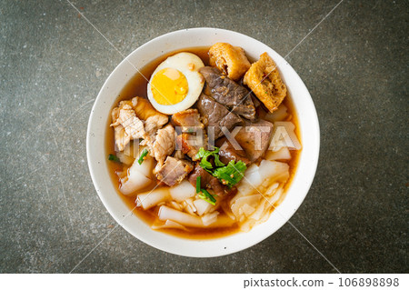 paste of rice flour or boiled Chinese pasta square in clear soup 106898898