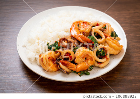rice and stir-fried seafood with Thai basil rice and stir-fried seafood with Thai basil 106898922