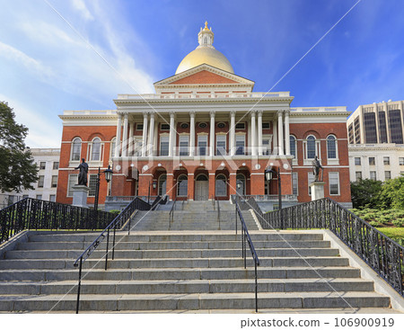 Massachusetts State House and State Library. Imposing red building with white columns and golden dome. Massachusetts State House and State Library. Imposing red building with white columns and golden dome. 106900919