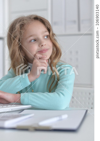 Cute and happy little girl children using laptop computer 106903140