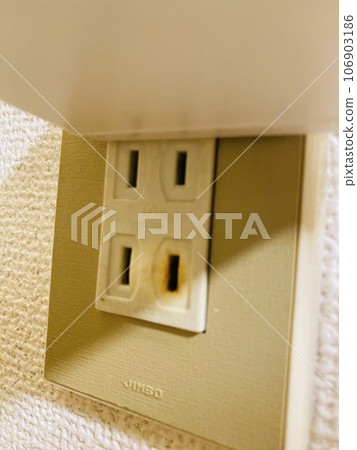 Burnt on electrical outlet Burnt on electrical outlet 106903186