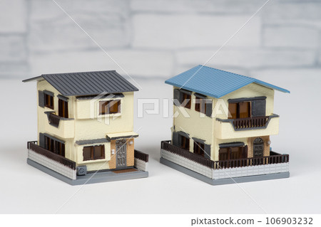 A model image of two wooden houses side by side 106903232