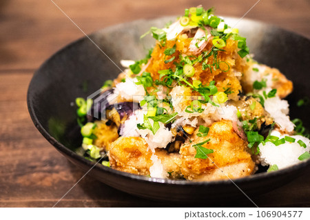 Fried eggplant and fried chicken with grated ponzu sauce Fried eggplant and fried chicken with grated ponzu sauce 106904577
