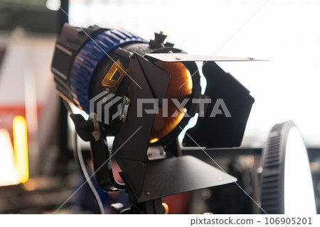 powerful light source. constant light spotlight. impulse monoblock with curtains . narrow beam light source powerful light source. constant light spotlight. impulse monoblock with curtains . narrow beam light source 106905201