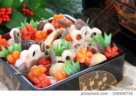 Handmade simmered rice dishes served in a box. Osechi cuisine Handmade simmered rice dishes served in a box. Osechi cuisine 106906736