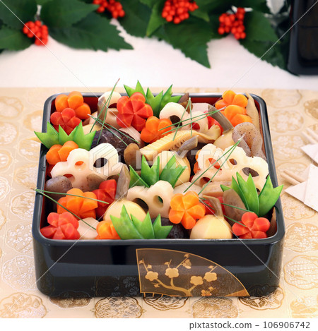 Handmade simmered rice dishes served in a box. Osechi cuisine Handmade simmered rice dishes served in a box. Osechi cuisine 106906742