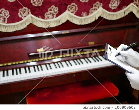 My parents' old upright piano 106909602