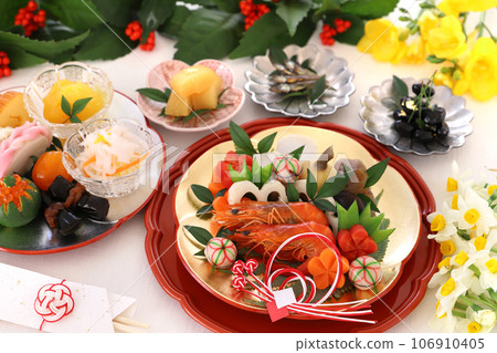 A gorgeous osechi dish for one person, served on a gold and silver plum plate.A osechi dish for one person. A gorgeous osechi dish for one person, served on a gold and silver plum plate.A osechi dish for one person. 106910405