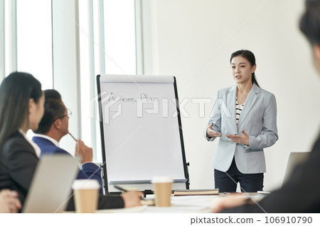 young asian businesswoman speaking during team meeting 106910790