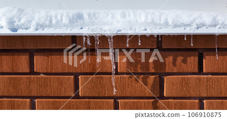 Icicles in winter time. 106910875