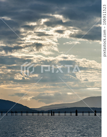 Golden sunset on Pacific ocean bay in Washington state 106911523