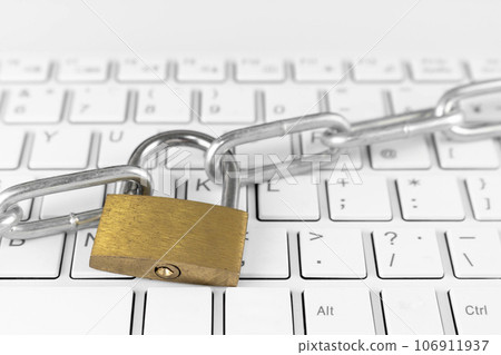 Laptop keyboard, chain and padlock. image of security 106911937
