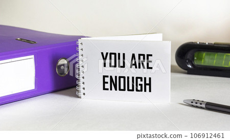 You are enough motivational quote in a notepad and on a white background 106912461