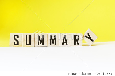 SUMMARY word on wooden cubes and white and yellow background SUMMARY word on wooden cubes and white and yellow background 106912565