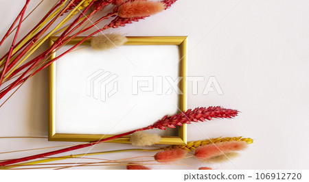 Frame for a letter framed by ears of wheat on a light background Frame for a letter framed by ears of wheat on a light background 106912720