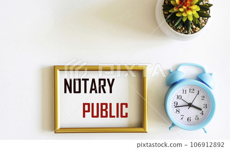 The text NOTARY PUBLIC is written on a photo frame and a white background. Concept meaning Agreement The text NOTARY PUBLIC is written on a photo frame and a white background. Concept meaning Agreement 106912892