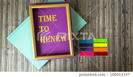 Time to renew and bright notepads and stickers on wooden table, business concept Time to renew and bright notepads and stickers on wooden table, business concept 106913147