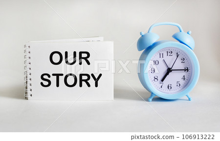 Our story, text written on notepad on white background, motivational concept for life and business Our story, text written on notepad on white background, motivational concept for life and business 106913222